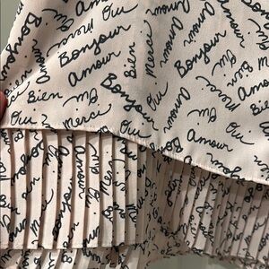 Banana Republic Pink Sleeveless dress shirt with French phrases all over